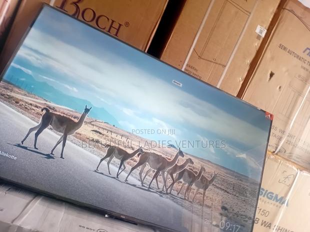 Perfectly Designed 55-Inch Tv – Sleek and Stunning Display · Photo 3