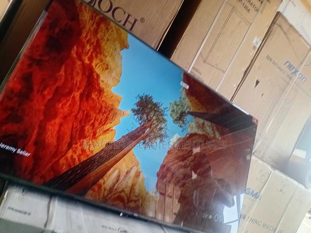 Perfectly Designed 55-Inch Tv – Sleek and Stunning Display · Photo 4