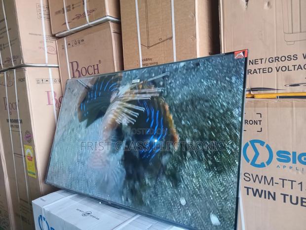 TCL 55” Ultra Hd Smart Tv – Built to Impress · Photo 4