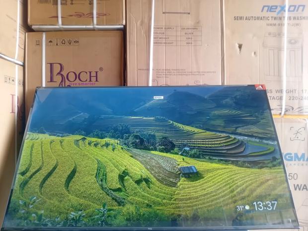Stunning 55-Inch Smart Television With Crystal-Clear Built-in Wi-Fi · Photo 3