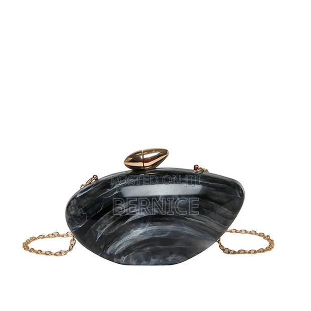 Elegant Blue Oval Clutch Bag – Stylish Unique Acryclic Design photo 4