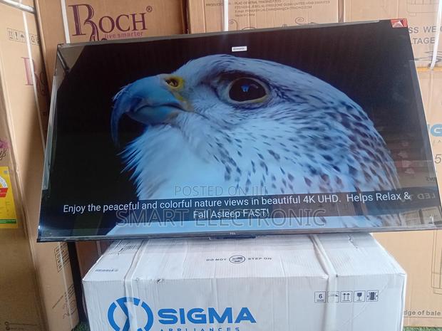 TCL 55inches Smart-Tv New in Box Uhd Flameless Design · Photo 3