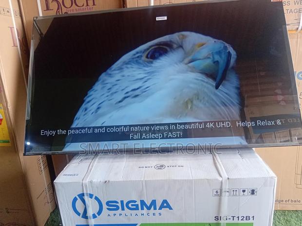 TCL 55inches Smart-Tv New in Box Uhd Flameless Design · Photo 4