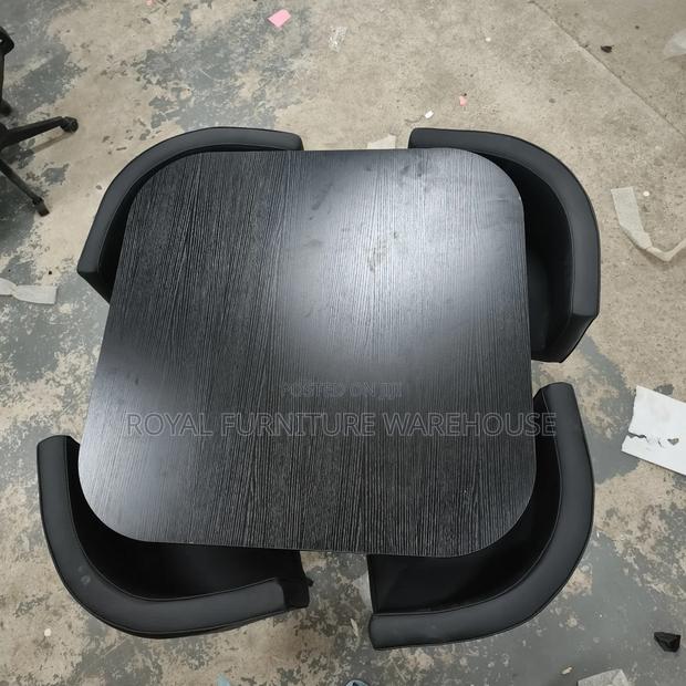 Black Wooden Table With 4 Comfortable Seats Dining Set · Photo 3