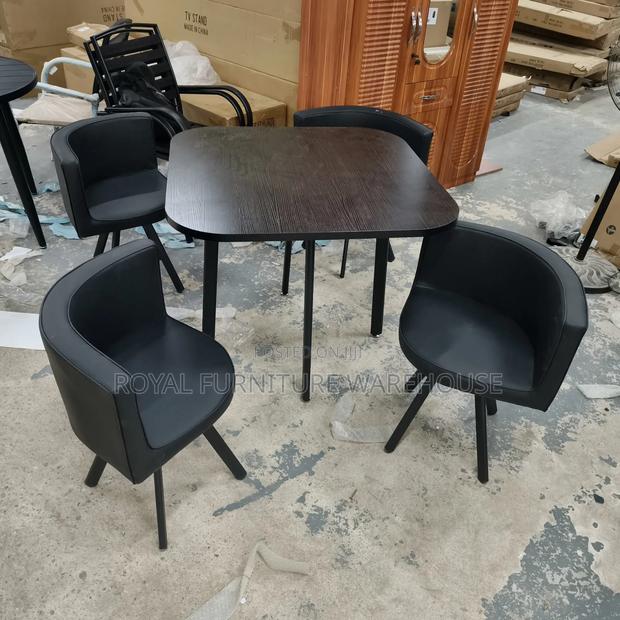 Black Wooden Table With 4 Comfortable Seats Dining Set · Photo 4