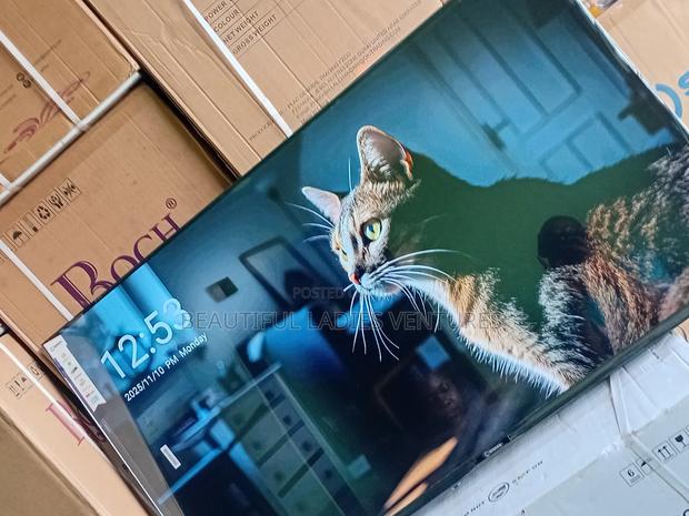 Elegant 55-Inch Android Smart Tv With Voice Control and Built-In · Photo 4