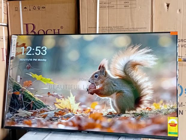 Breathtaking 55-Inch Smart Tv With Slim Frame and Powerful Tv · Photo 3
