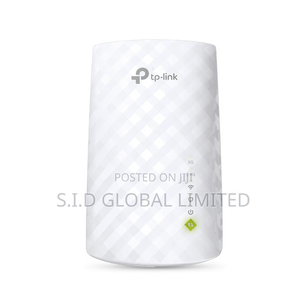 Tp-link Ac750 Creates A Mesh Network By Connecting To A Tp-link · Photo 2