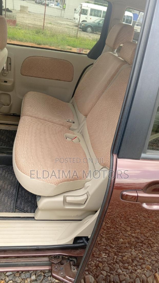 Toyota Sienta 2012 Brown photo 7