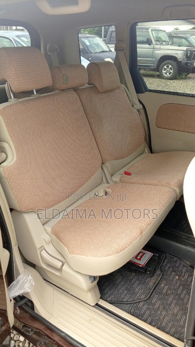 Toyota Sienta 2012 Brown photo 9
