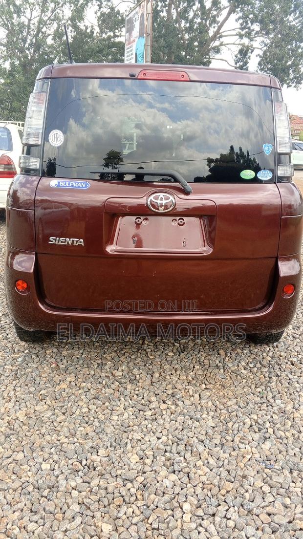 Toyota Sienta 2012 Brown photo 6