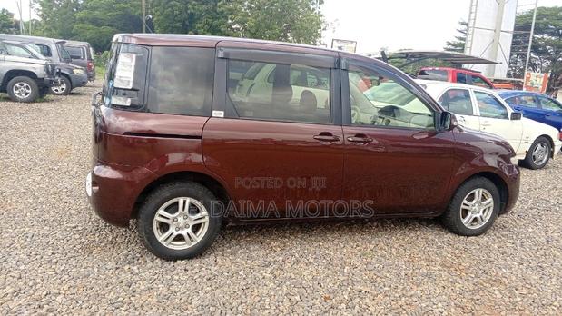 Toyota Sienta 2012 Brown photo 2