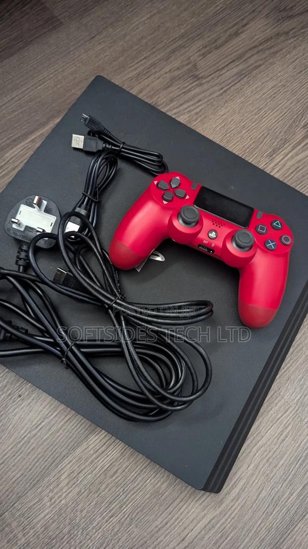 Playstation 4 Pro With Two(2) Controllers And 17 Games Promo!! photo 3