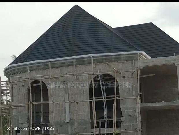 Desired Shingle Euro Tiles Project by Kings Roofing Company LTD