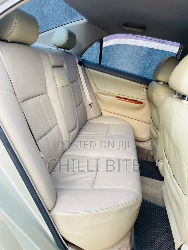 Toyota Corolla Base 4dr Sedan (1.8L 4cyl 5M) 2011 Silver photo 7
