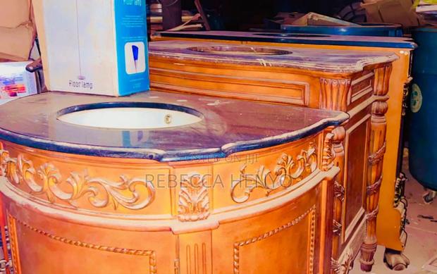 Luxury Cabinet Sink With A Marble Surface