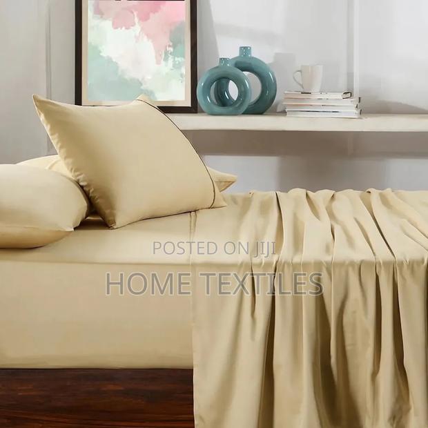 1 Fitted Beige Bedsheet ,1 Flat Beige Bedsheet and 4 Pillowcases