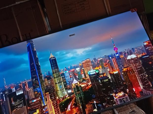 55-Inch Smart Tv Offering High-Definition Visuals and Wi-Fi Access · Photo 3