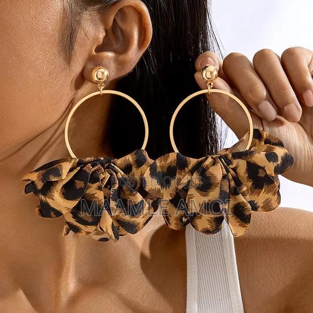 Earrings, Necklaces and Chunky Bangles · Photo 1