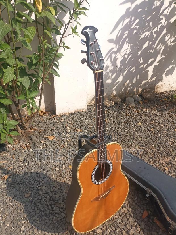 Matrix by Ovation in Solid Case With Strap New Set of Strings