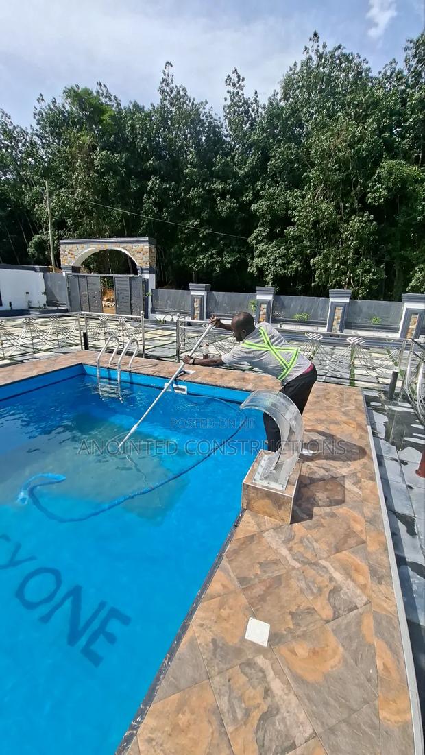 Swimming Pool Cleaning and Treatment · Photo 3