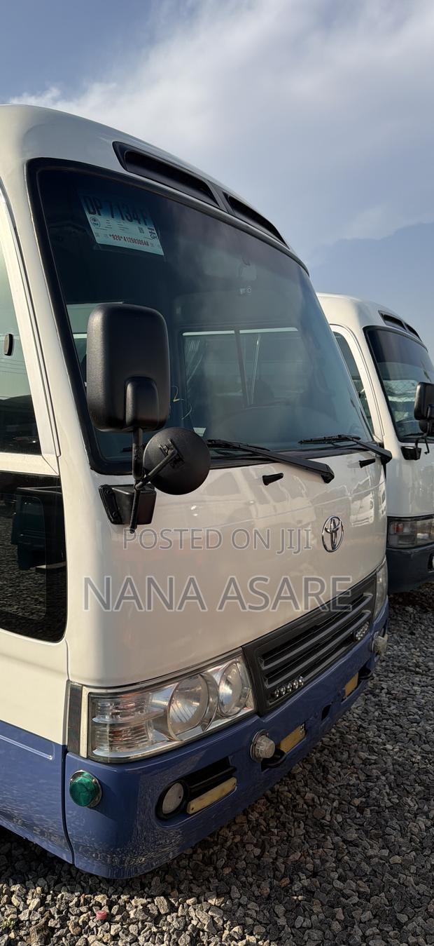 Toyota Coaster 2015 White · Photo 3