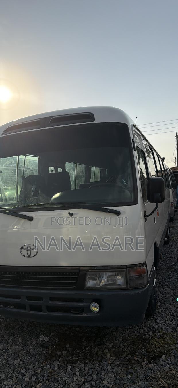 Toyota Coaster 2014 White · Photo 3