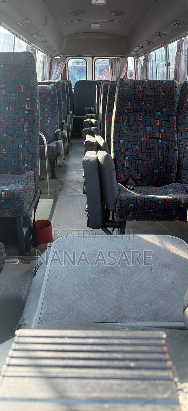 Toyota Coaster 2014 White · Photo 4