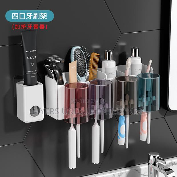 Stylish Wall Mounted Toothpaste Dispenser/Organizer · Photo 2