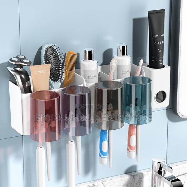 Classy Toothpaste Dispenser /Toothbrush Holder With Cups Organizer · Photo 2