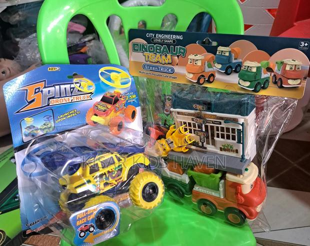 Kids Car Spin Car and Dinosaur Team Truck 1 Years to 4 Years · Photo 2