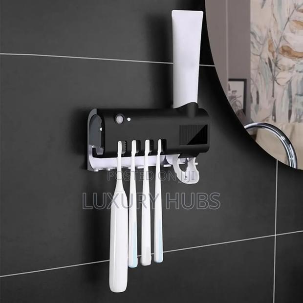 Protective Toothbrush Dispenser Holder · Photo 1