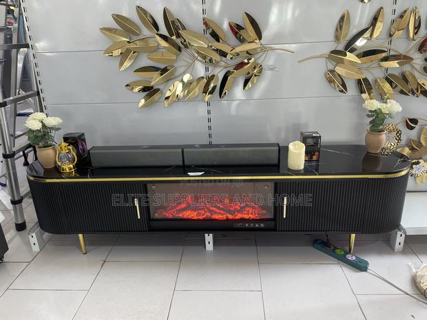 Tv Stand With Electric Fireplace · Photo 1