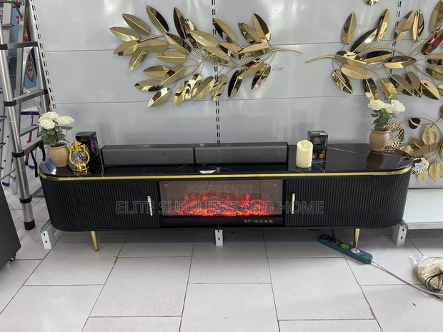Tv Stand With Electric Fireplace · Photo 2