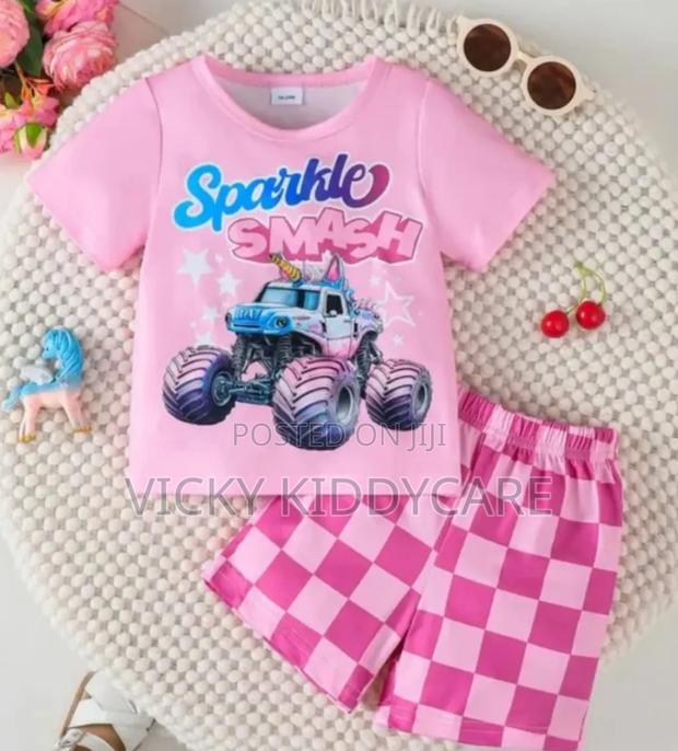 Kids' Pink "Sparkle Smash" Car Print T-Shirt Checkered Shorts Set.