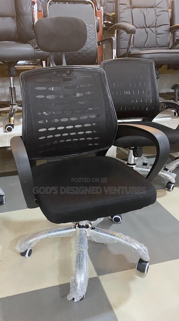 An Authentic Swivel Chair · Photo 2