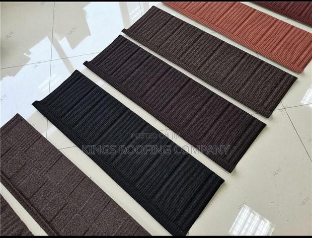 Brown, Orange, Black and Red Classic Euro Roofing · Photo 2
