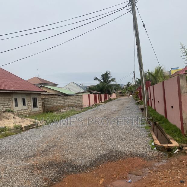 70x100 Titled Land at Oyarifa High Tension · Photo 1