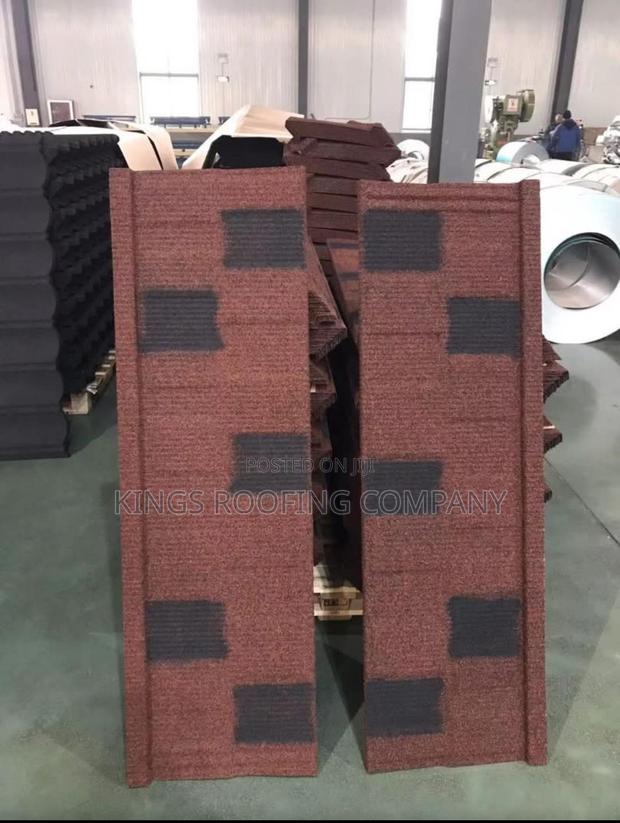Specially Branded Brown-Black Shingle Roofing · Photo 2