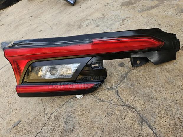 Highlander Grand Bootlight 2025 Driver Side