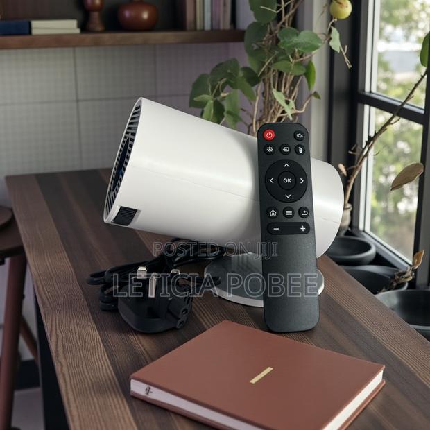 Compact Hd Home Projector + Remote — Crystal-clear Viewing photo 2