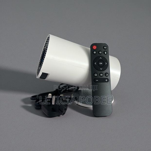 Portable Led Projector With Remote — Great For Work & Entertainment” photo 2