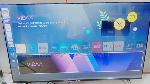 **Ailyons 55" Smart Tv High-Definition Viewing** · Photo 4
