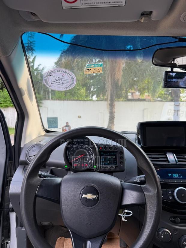 Chevrolet Spark 2012 Silver photo 5