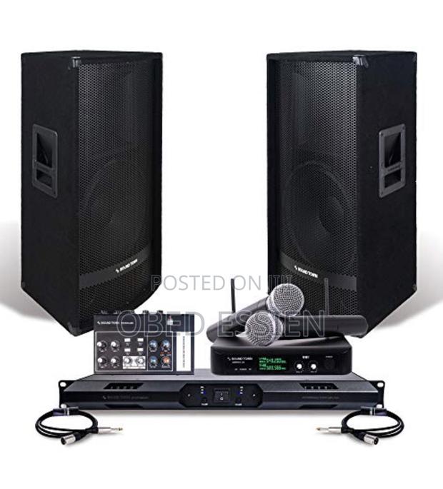 A Pair of JBL Speakers With Amp and Microphone · Photo 3