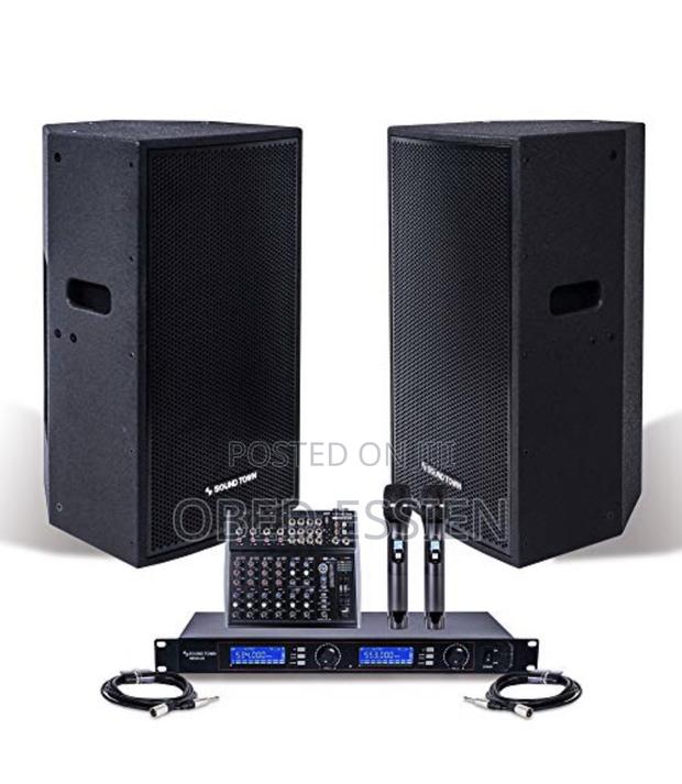 A Pair of JBL Speakers With Amp and Microphone · Photo 4