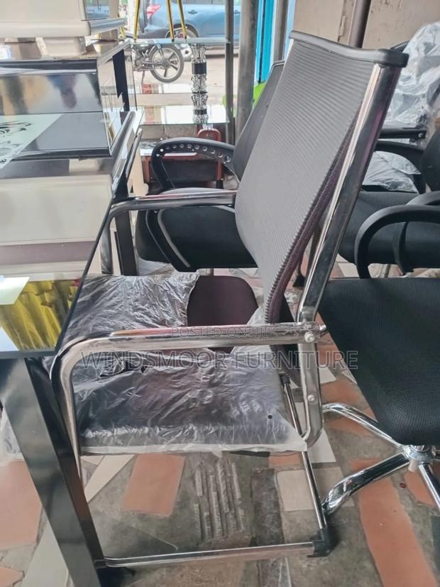 An Authentic Black Visitor's Chair