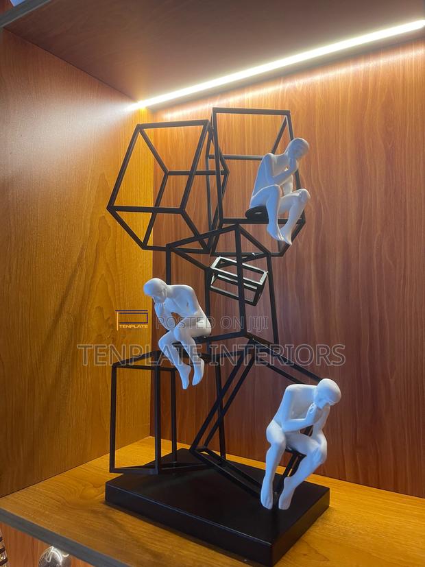 Creative Thinkers On Stack Cubes Sculpture photo 2