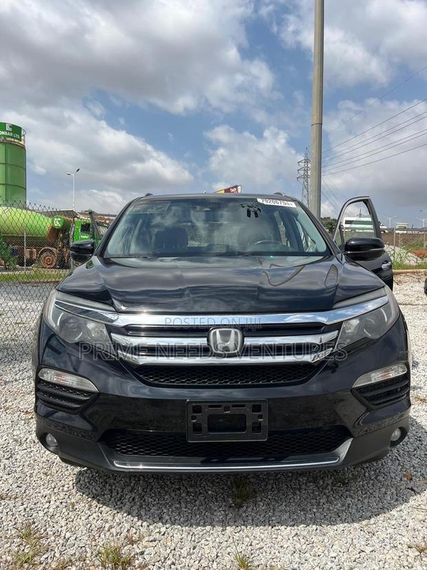 Honda Pilot Touring 4dr SUV 4WD (3.5L 6cyl 9A) 2017 Black