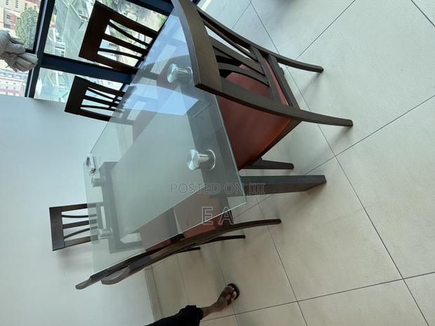 Modern Glass-Top Dining Table With 4 Chairs photo 2